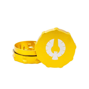 Yellow 2 piece herb grinder made of aerospace-grade aluminum, featuring a precision-engineered design for perfect grinding.