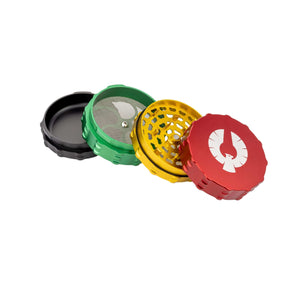 4 Piece large flat top herb grinder in black, green, yellow, and red colors, showcasing premium aluminum design.