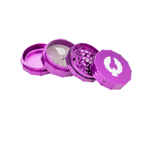 Purple 4 Piece Large Flat Top herb grinder showcasing its durable design and premium aluminum construction.