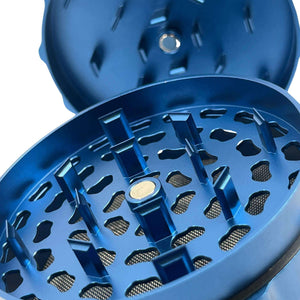 Close-up of the Phoenician 4 Piece Large blue weed grinder, featuring precision teeth and mesh screen for optimal grinding.