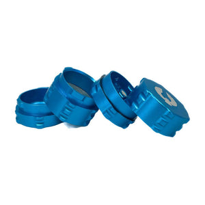 Blue 4 piece herb grinder showcasing sleek design and innovative features ideal for cannabis enthusiasts.