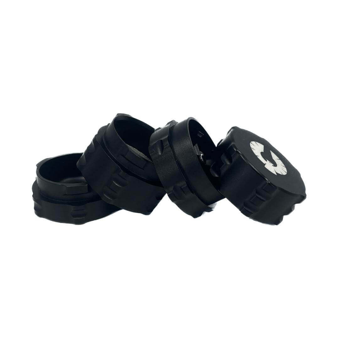 4 Piece small black herb grinder set from Phoenician, designed for cannabis enthusiasts, showcasing innovative features.