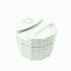 Unique herb grinder online featuring a sleek white design with a removable top for easy grinding and storage.