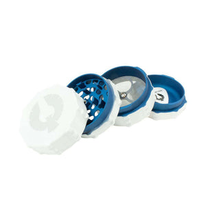 Limited Edition Blue Moon Grinder in white and blue, showcasing precision-engineered design for smooth cannabis grinding.
