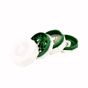 Limited Edition Harvest Moon Grinder in white and green, showcasing the innovative design for a smooth herb grind.