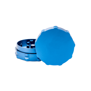 Custom blue two-piece weed grinder made from aerospace-grade aluminum for dispensaries.