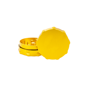 Custom yellow two-piece weed grinder for dispensaries, precision-engineered for a flawless grind.