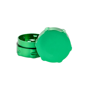 Custom green weed grinder showcasing sleek design and durable aluminum construction for dispensaries.