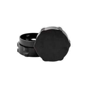 Custom black weed grinder with dual compartments for smooth grinding, ideal for dispensaries.