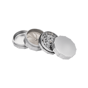 Custom 4 Piece Large Flat Top herb grinder showcasing premium aluminum design and durable build for optimal cannabis use.