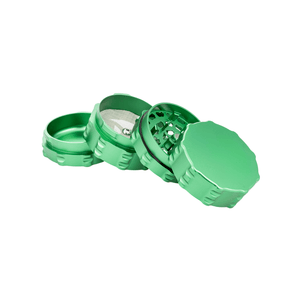 Custom 4 piece green grinder showcasing its compact, sleek design and precision grinding capabilities for cannabis enthusiasts.