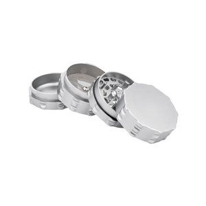 Custom 4 piece medium grinder in silver, featuring a sleek design and precision grinding for cannabis enthusiasts.