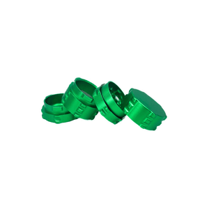 Four green pieces of a custom cannabis grinder stacked together on a white background.