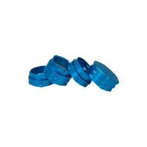 Custom blue 4 piece small grinder designed for cannabis, showcasing sleek and innovative features.