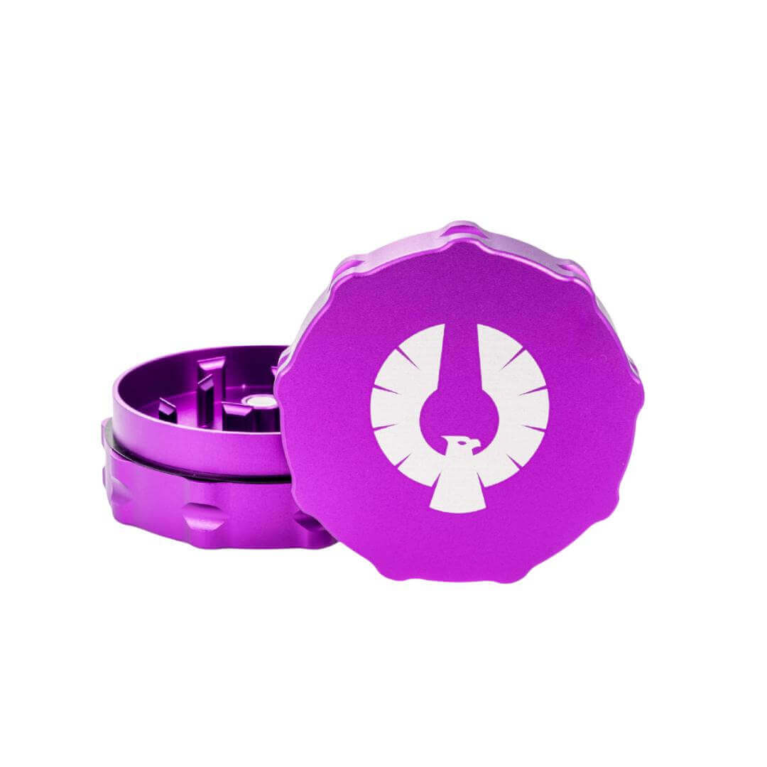 Two-piece purple herb grinder made from aerospace-grade aluminum with a durable anodized finish.