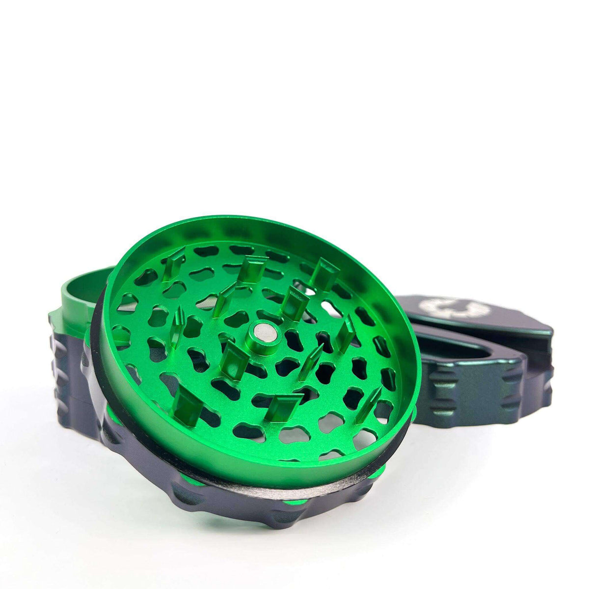 Limited Edition Atlantis Grinder with color-shifting blue/green exterior and green interior, perfect for unique weed grinders.