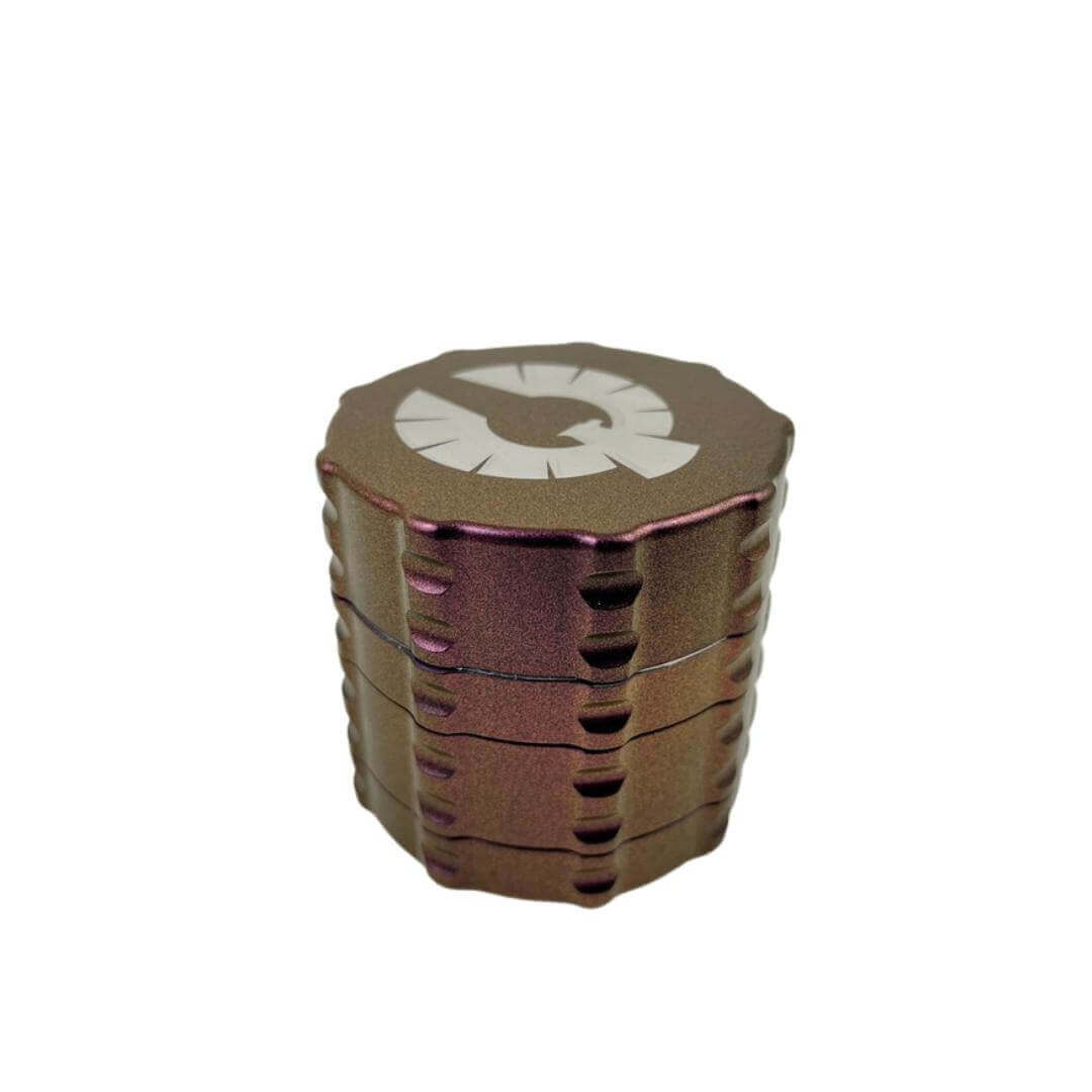 Limited Edition Starseed Grinder in color-shifting copper/bronze with logo, perfect for unique weed grinders for sale.