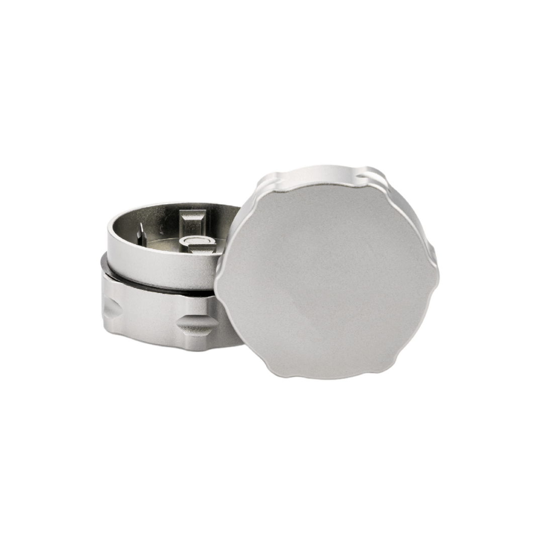 Custom weed grinder for dispensary in sleek silver finish, showcasing two-piece design and sharp teeth for effortless grinding.