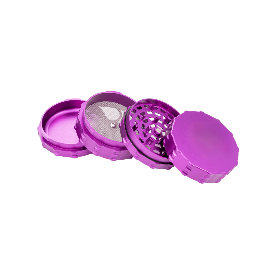 Custom 4 Piece Large Flat Top herb grinder in vibrant purple, showcasing its durable, high-quality design for cannabis enthusiasts.