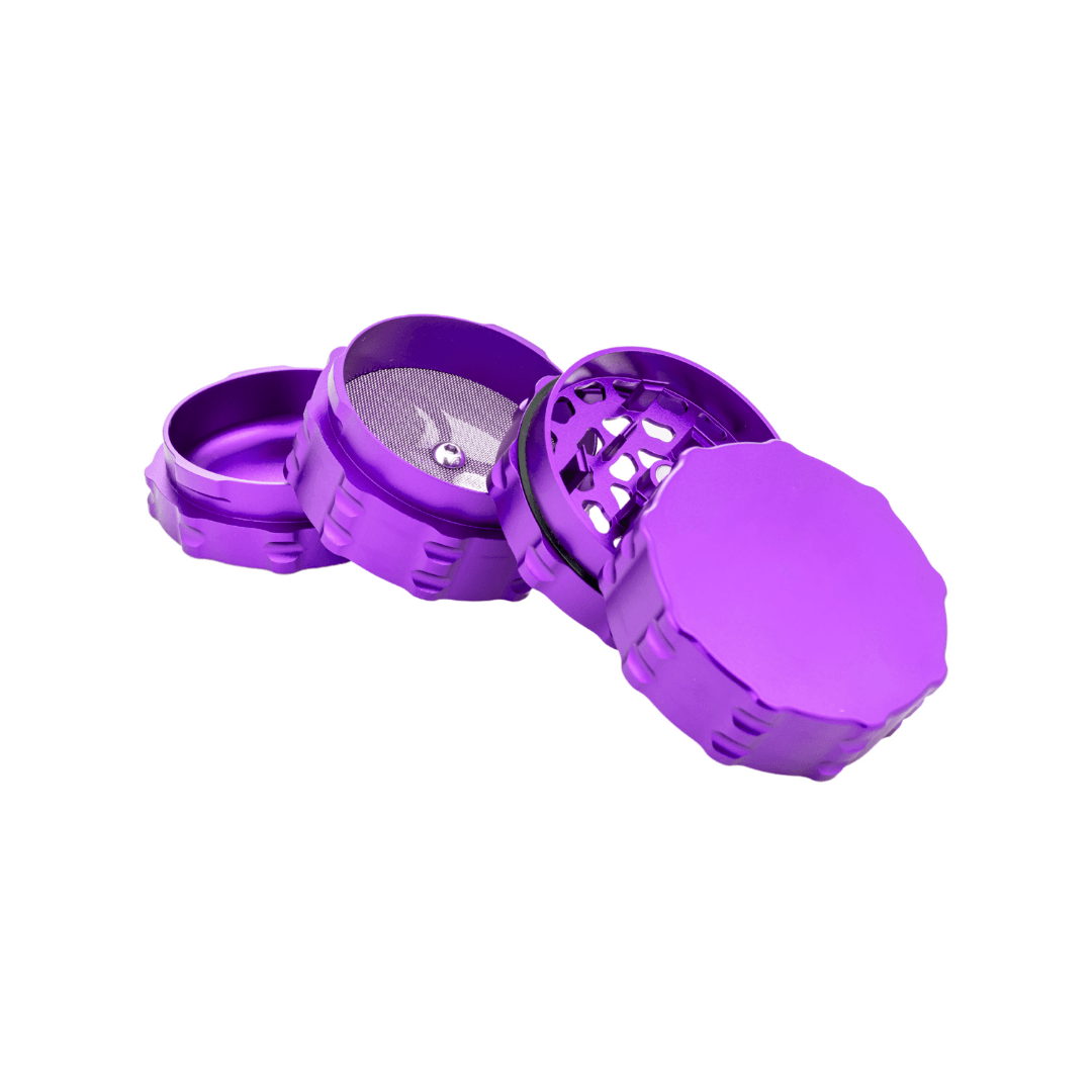 Custom 4 piece purple grinder showcasing aerospace-grade aluminum and innovative design for cannabis enthusiasts.