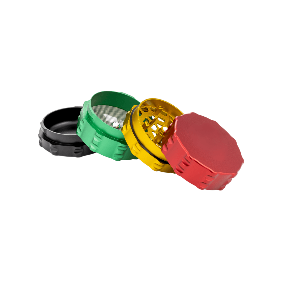 Custom 4 piece grinder in black, green, yellow, and red, showcasing sleek design and precision craftsmanship.